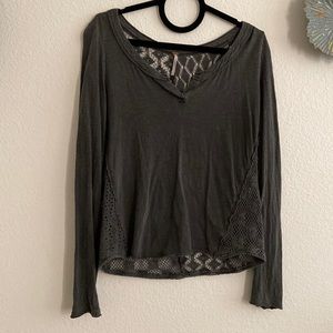 Free people grey top with see through design on the bottom and back size S/P